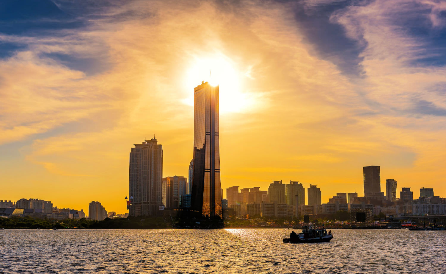 The 63 building is the second tallest building in Seoul, South Korea. Its glass windows reflect yellow colors because of the gold-plated glass panels. 63 Building is a popular place for family or friends, and young couples who like leisure and relaxation. 