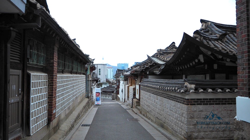 bukchon hanok village houses street with Namsan Tower view