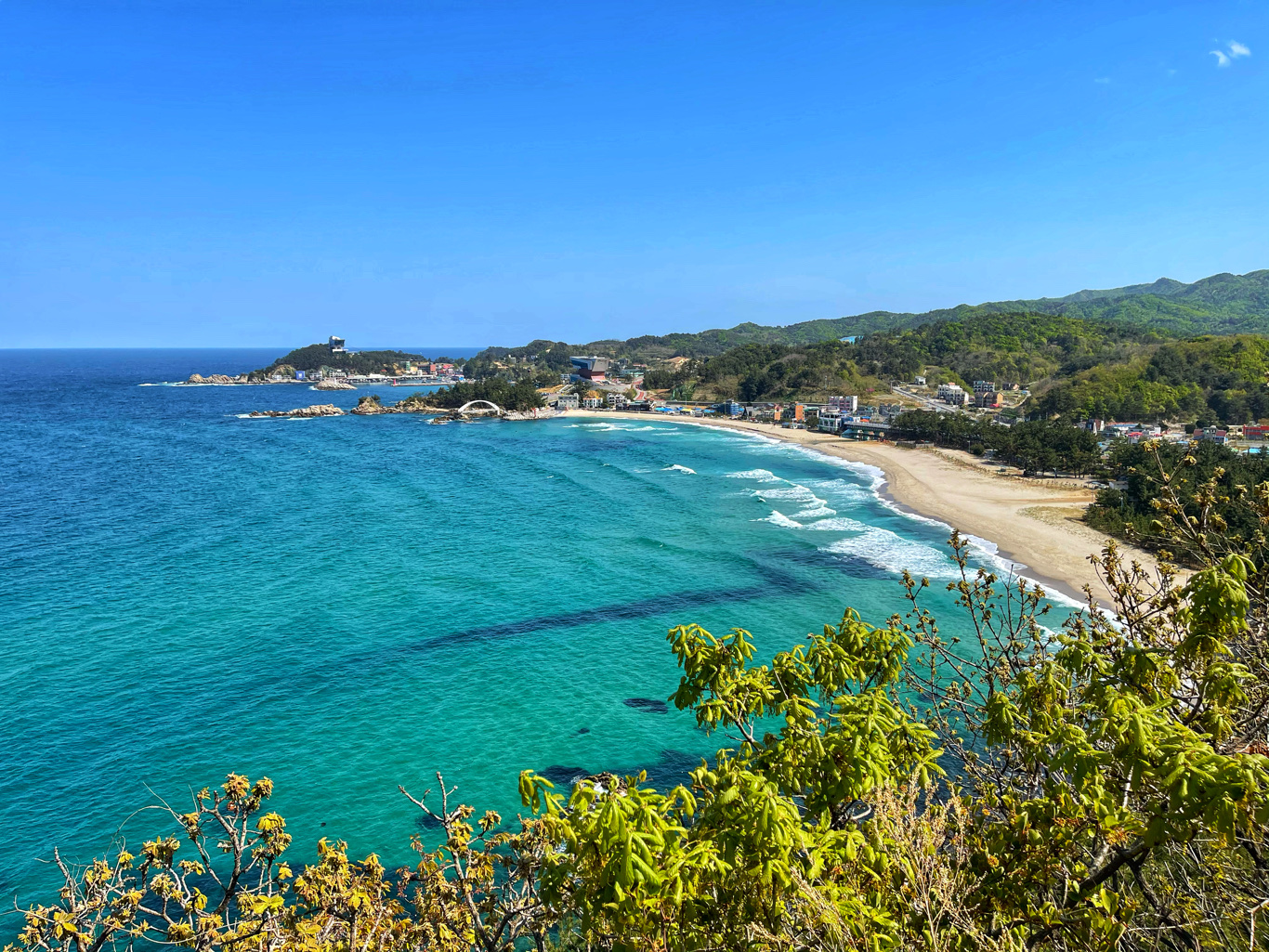 Samcheok Beach is a beautiful long stretch of white sandy beach in Gangwon Province, South Korea. The area is serene but attracts more guests during holidays.